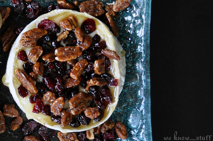This super easy Barbecue Brie Recipe is incredibly delicious and just so gosh darn easy to make, you'll smack yourself upside the head for not thinking of it sooner. Top it with local honey, dried cranberries and nuts for the perfect summer appetizer!