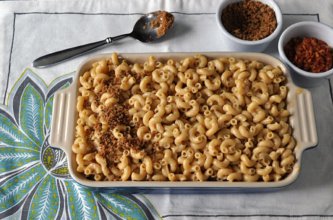 his homemade Baked Mac And Cheese With Crunchy Topping recipe gets it's crunch from crispy bacon and panko, and it's spicy kick from tabasco sauce! 
