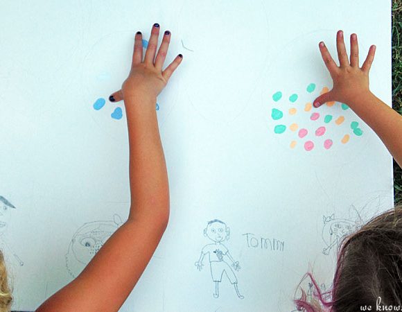This DIY canvas wall art project is a simple, cheap way to add original artwork to your home. Caricatures of the kids and thumbprint balloons keep it sweet.