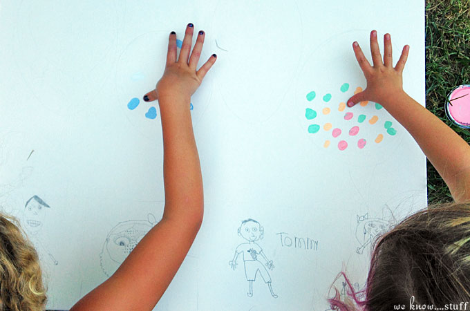  This DIY canvas wall art project is a simple, cheap way to add original artwork to your home. Caricatures of the kids and thumbprint balloons keep it sweet. 