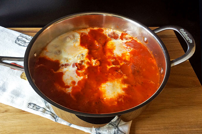Eggs in Purgatory may sound ominous, but it's quite delicious. Simply poach eggs in a spicy tomato sauce, sprinkle with parmesan and dunk crusty bread into it. OMG!