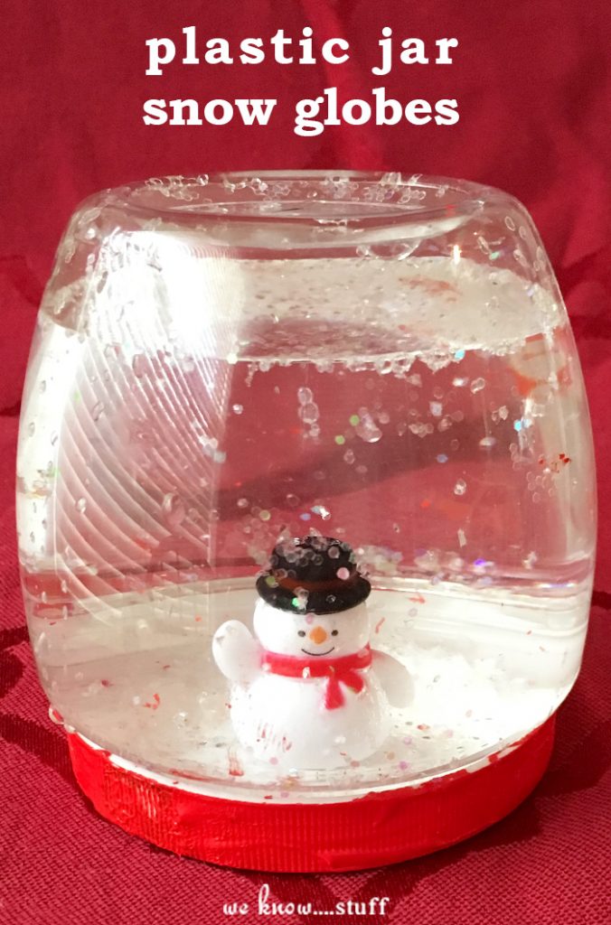 Our super simple Snow Globes For Kids are a fun way to spend time with your kiddos this holiday season. Plastic jars keep them from breaking in tiny hands.  