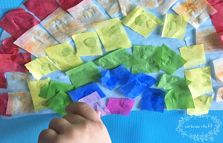 This super fun Suncatcher Craft With Tissue Paper makes really cute Stained Glass Rainbows. It's a great sensory activity for little hands and makes an easy classroom project for spring!