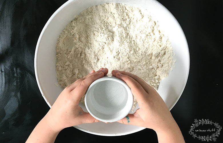Our "recipe" for homemade cloud dough or moon sand kids love uses just two ingredients. The kids loved running their hands (and toys) through the silky smooth sand...and so did I!