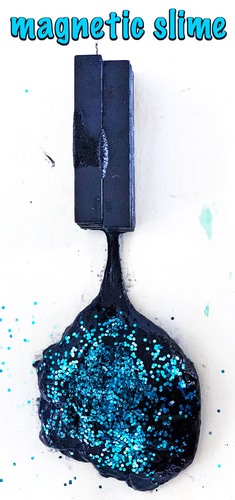 Learn how to make black slime thats magnetic! This homemade slime craft uses Elmer\'s glitter glue and glow in the dark glue to create glittery black slime. #slime #magneticslime #blackslime
