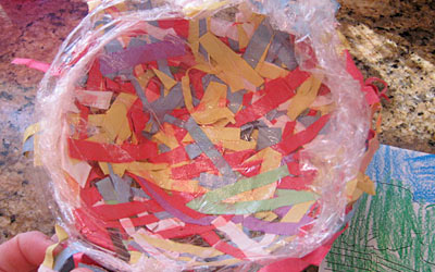 These adorable construction paper birds nests are a fun way to use up leftover bits of paper and make terrific homemade Easter gifts for friends and family!