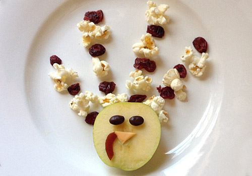 I like to put out a few healthy snacks for the kids to nosh on before our big turkey dinner. These funny turkey themed snacks are perfect for little kids.